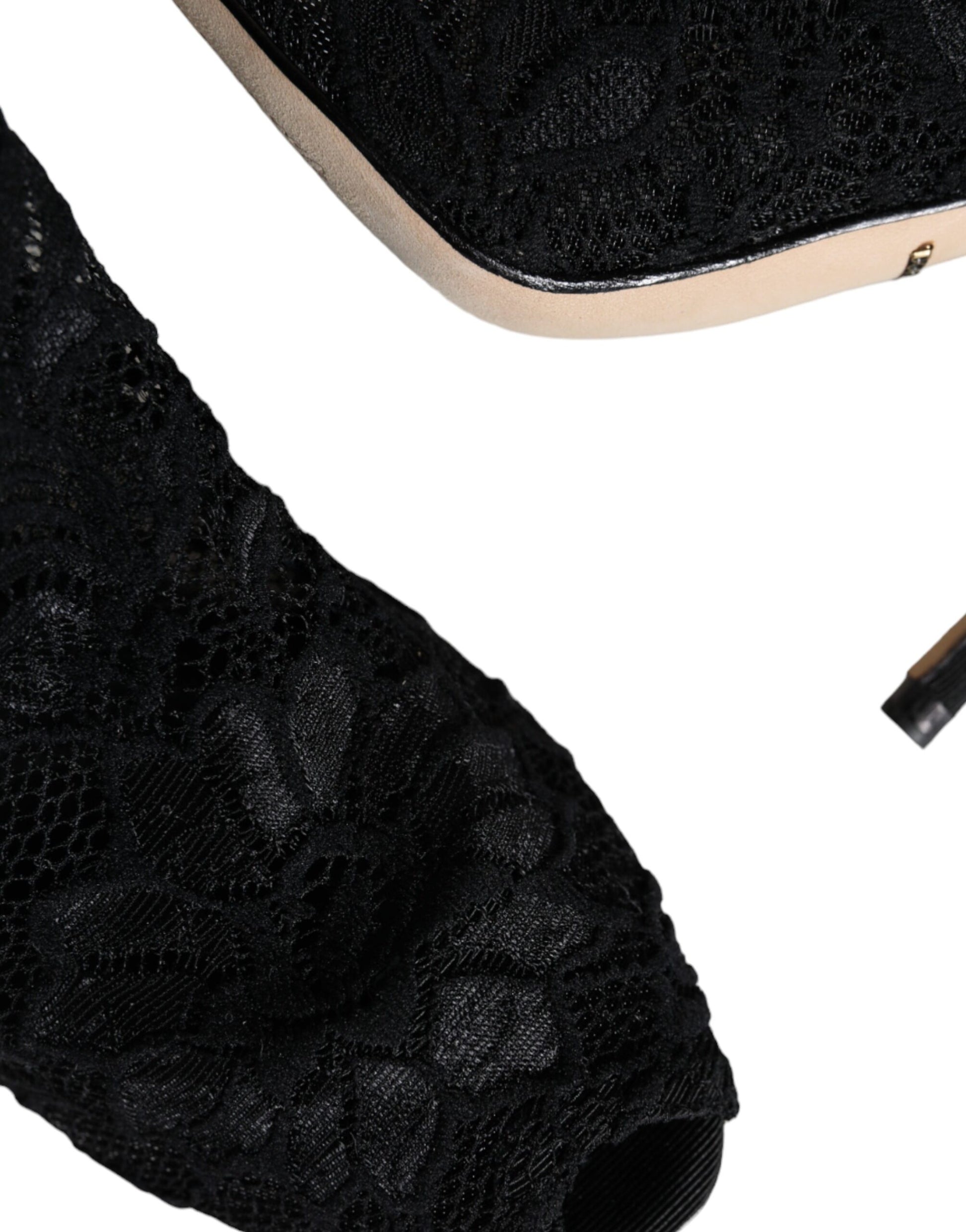 Black high heel shoe with a patterned texture on the upper part