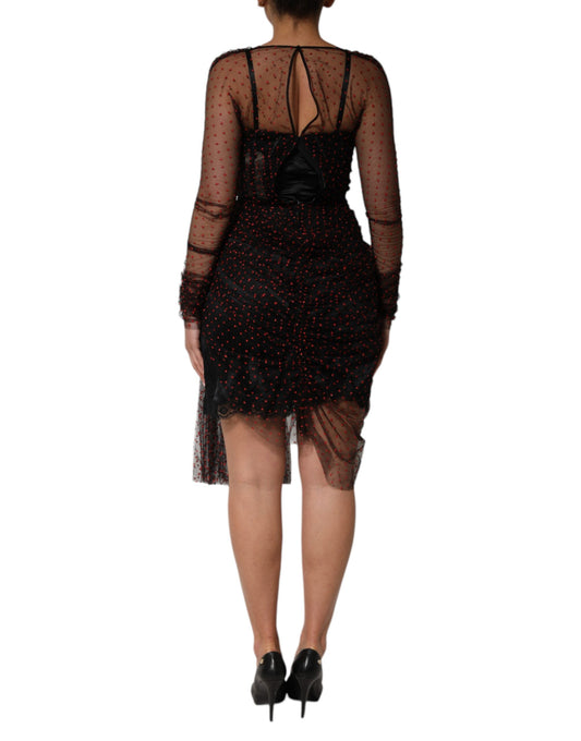 A black lace trim sheath dress with long sleeves and a high neckline