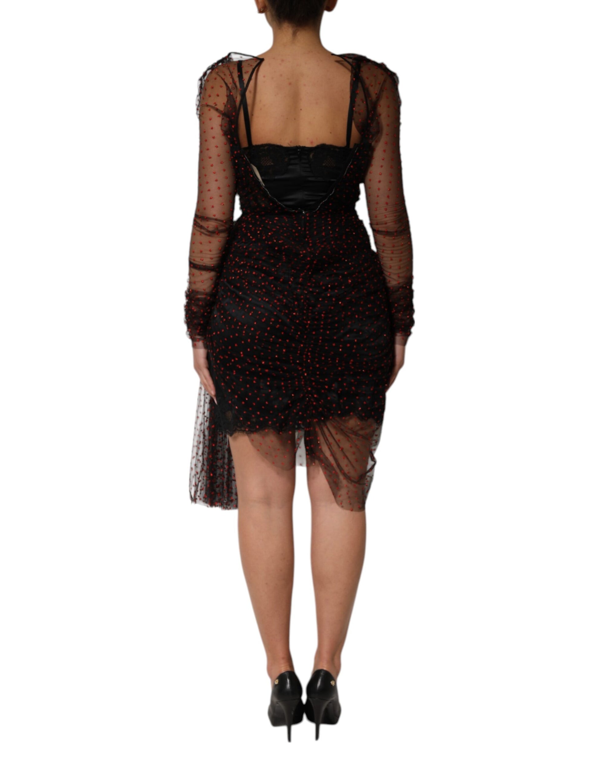 A black lace trim long sleeve sheath mini dress with a high neckline