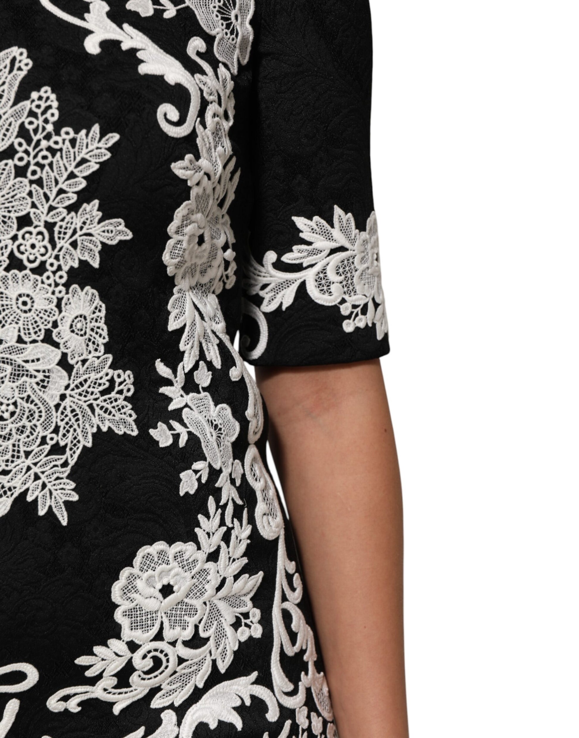 Black embroidered top with floral pattern