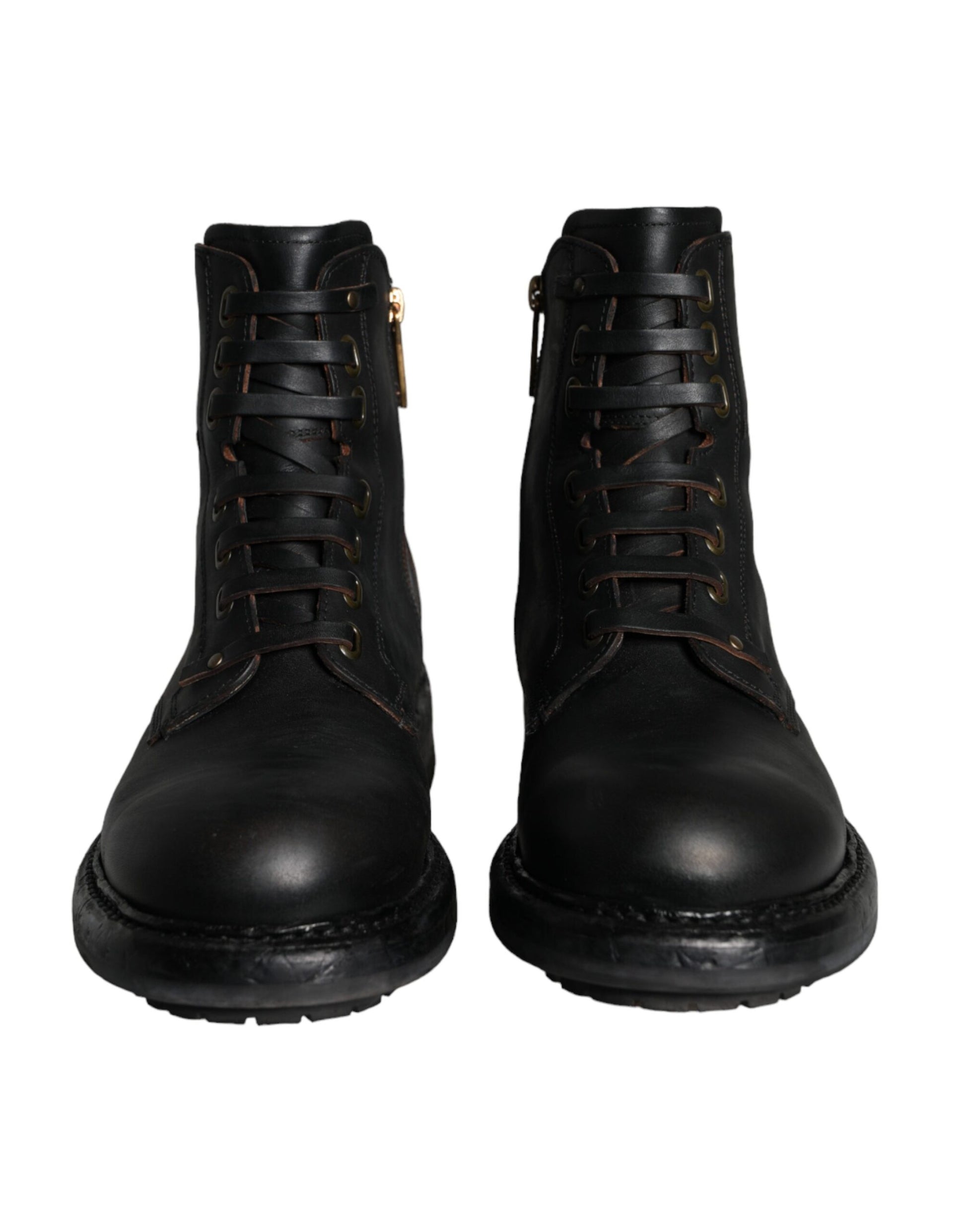 Pair of black leather boots with laces
