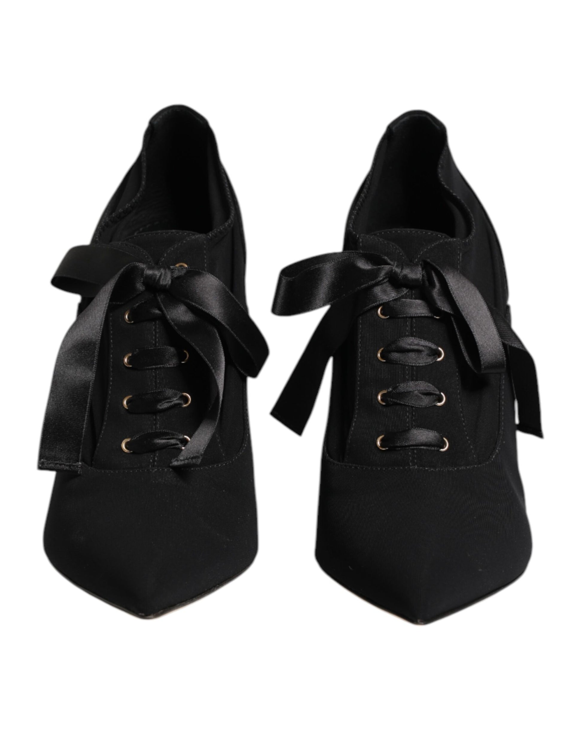 Pair of black ballet shoes with ribbon laces