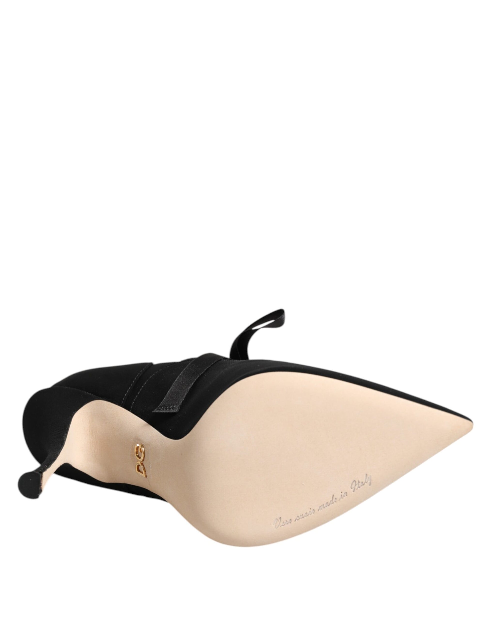 This is a black and tan back support brace
