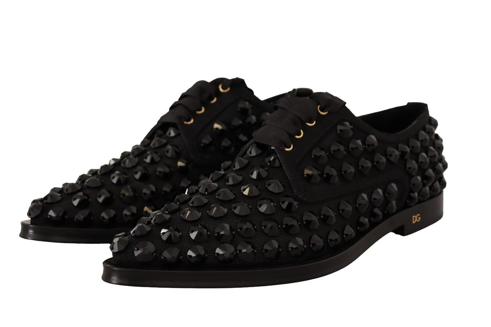 Pair of black shoes with studs and buckles