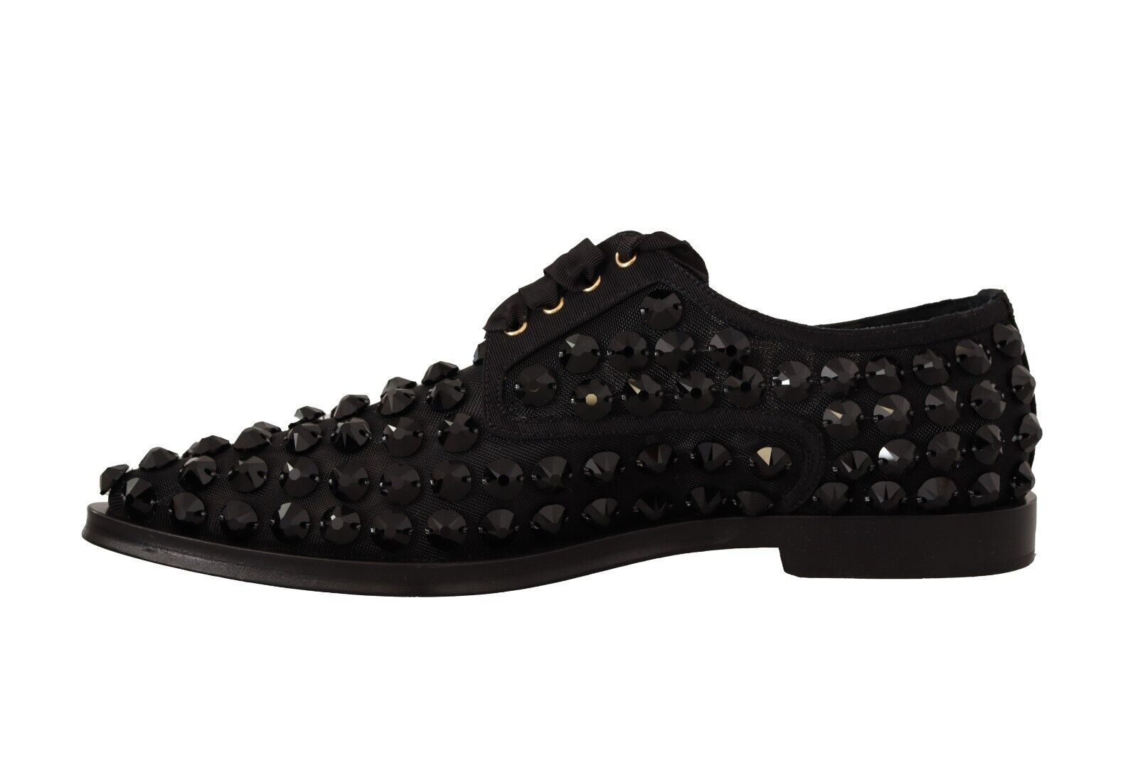 Black shoe with studded detailing and a pointed toe