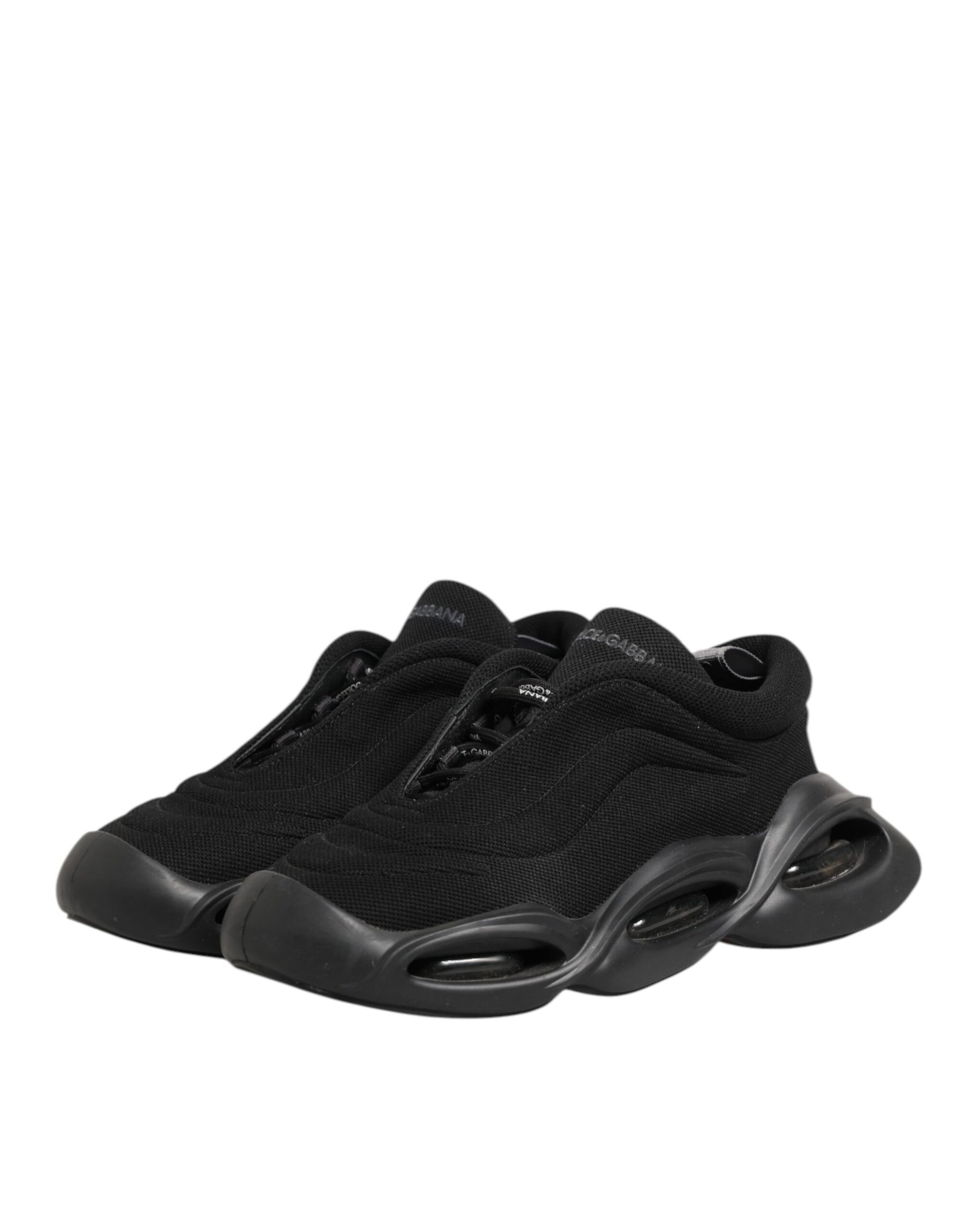 A black lace-up sneaker with a wave design on the side, suitable for men