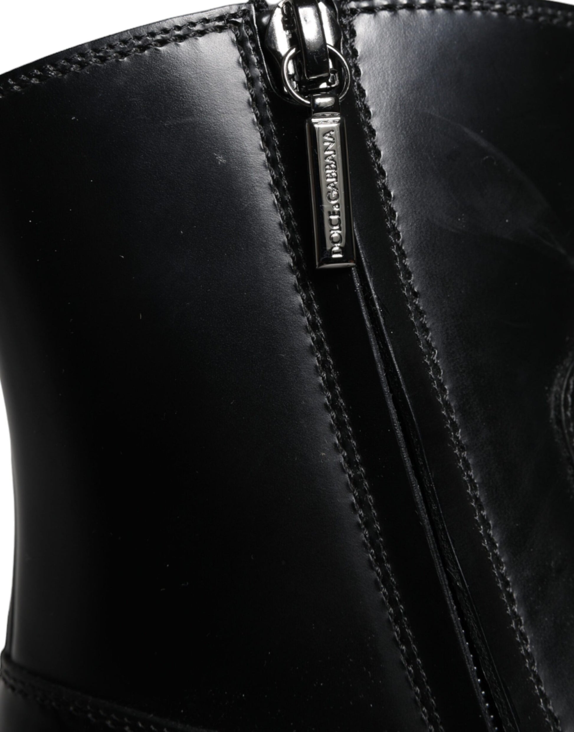 Black leather boot with zipper closure