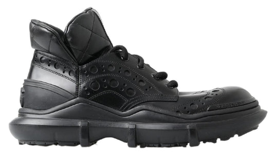 Black leather work boot with laces and a pull tab on top