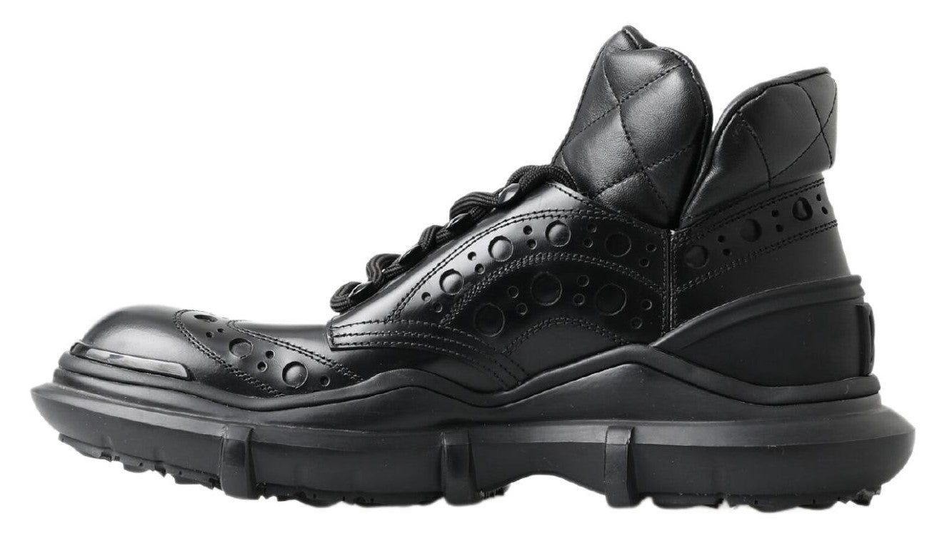 Black hiking boot with laces and a pull tab on top