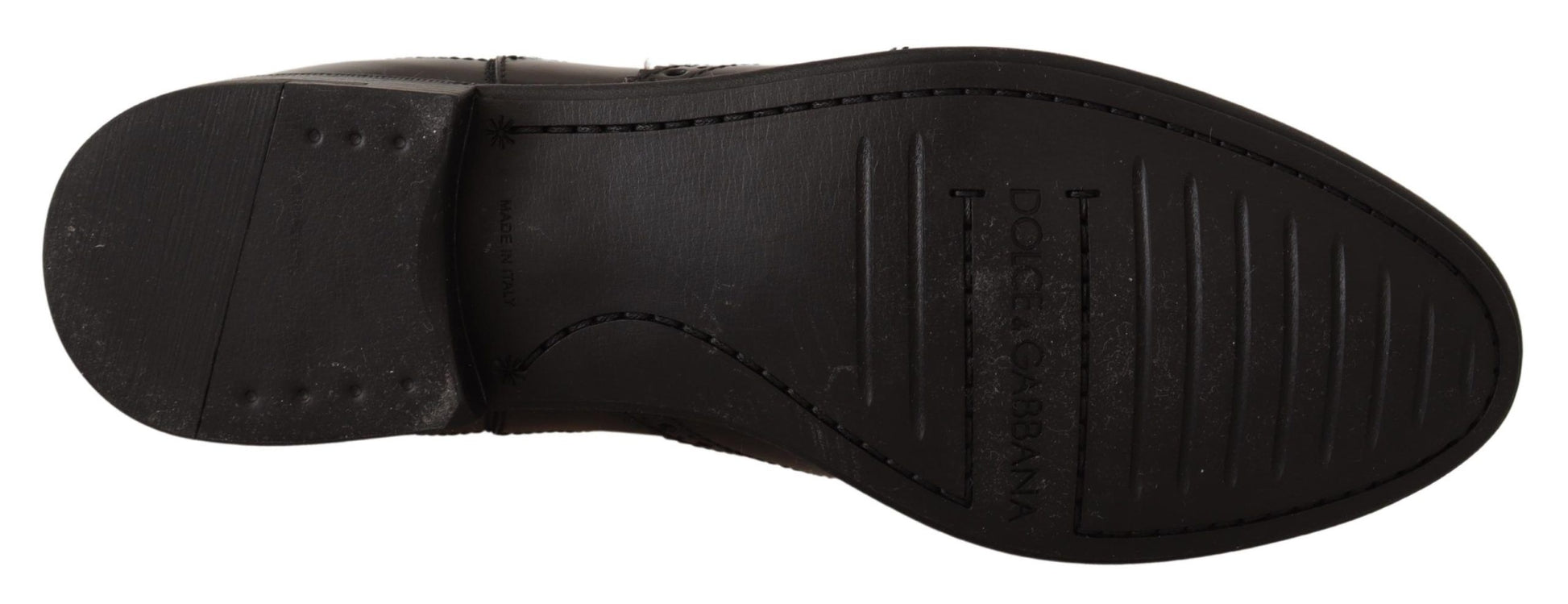 Black shoe with white sole and laces