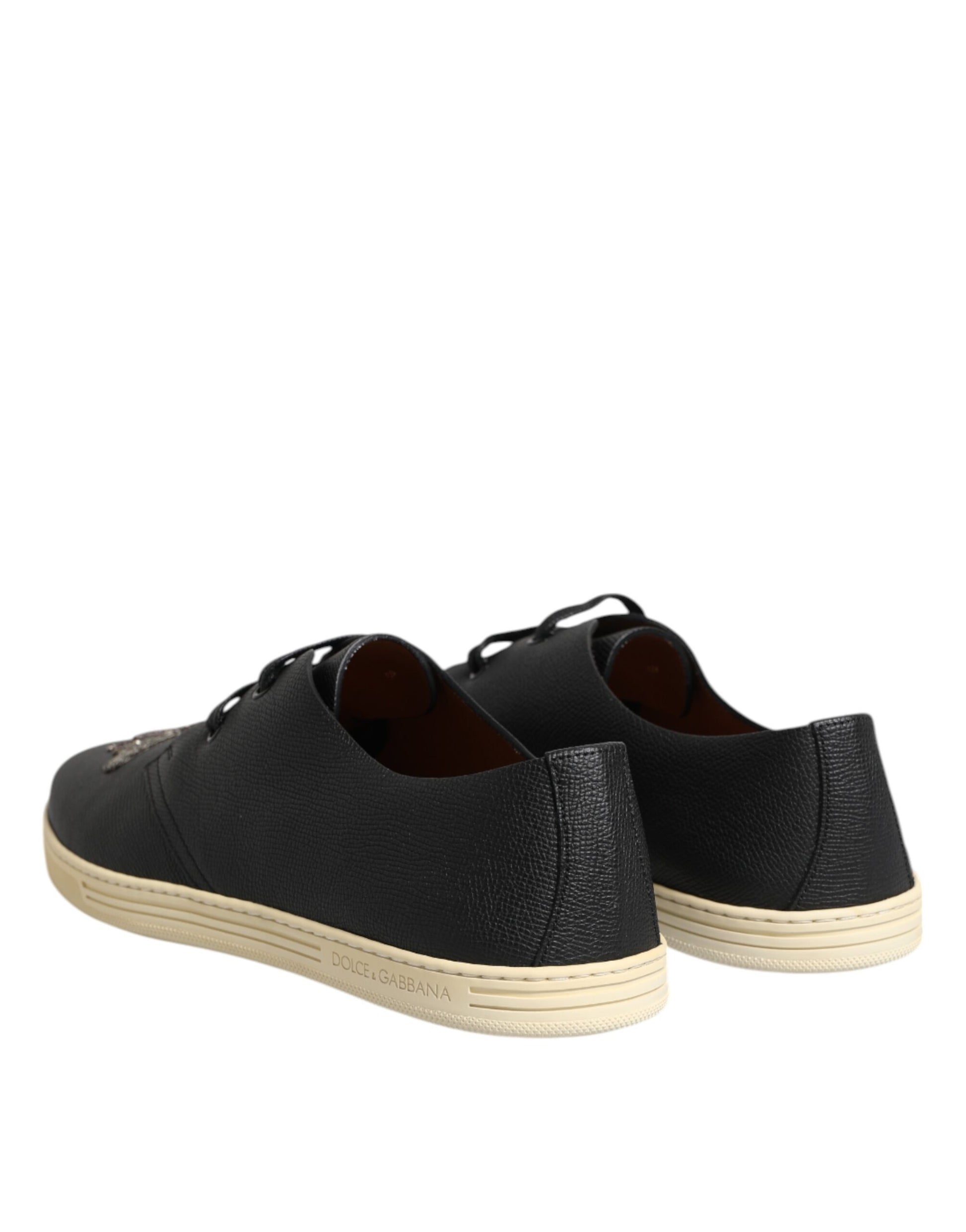 Pair of black shoes with white soles