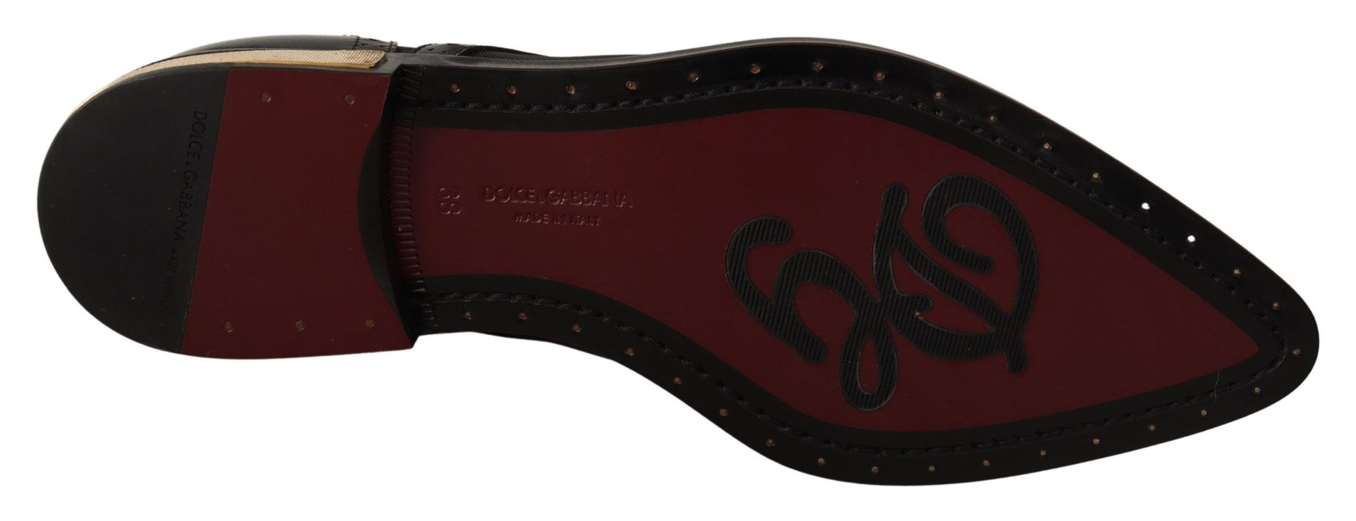 Red and black shoe with white sole