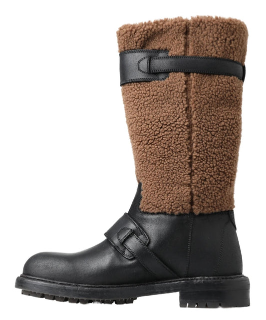 Brown fur lined boot with black leather exterior and strap closure