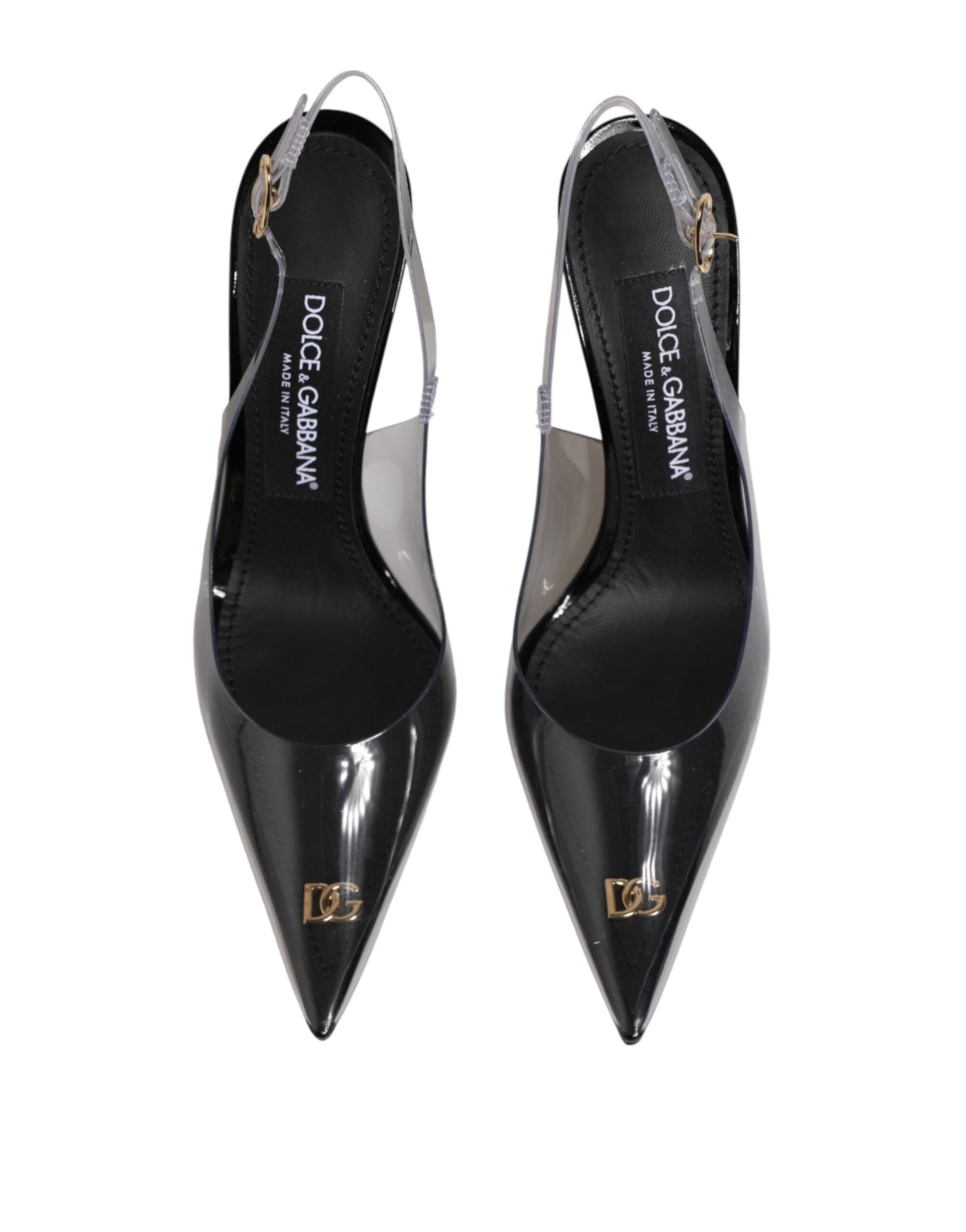 Pair of black high heel shoes with gold accents