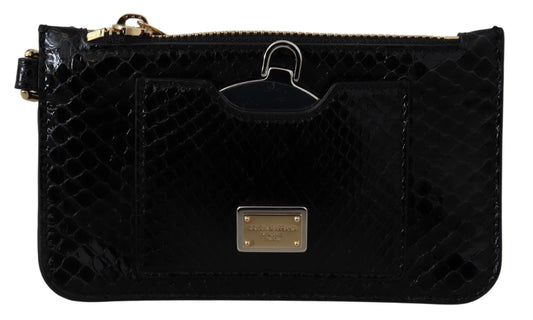 Black snake print handbag with gold hardware