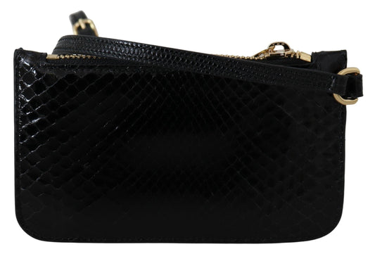 Black snake skin clutch purse with gold accents