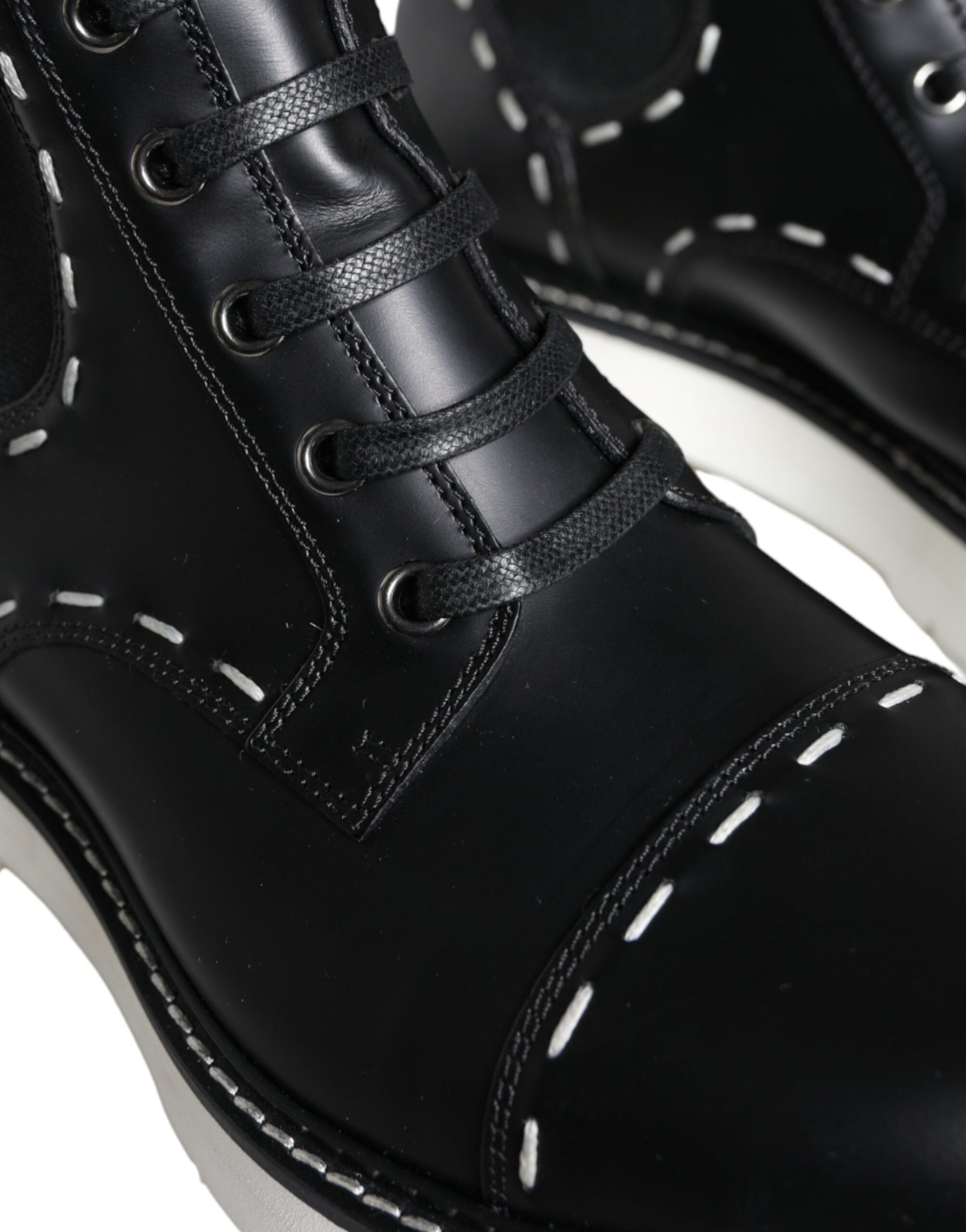 Black leather lace up boot with stitching details