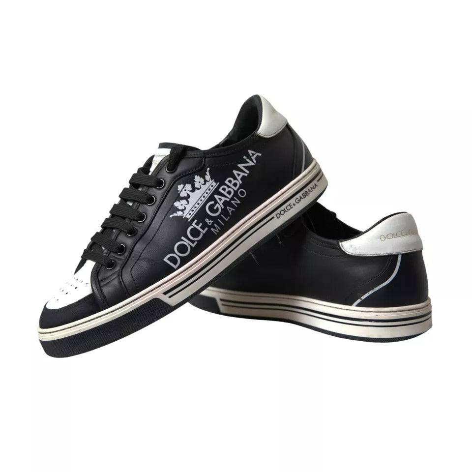 Black leather sneakers with white sole, featuring crown logo on side and back