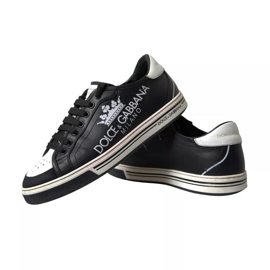 Black leather sneakers with white sole, featuring crown logo on side and back