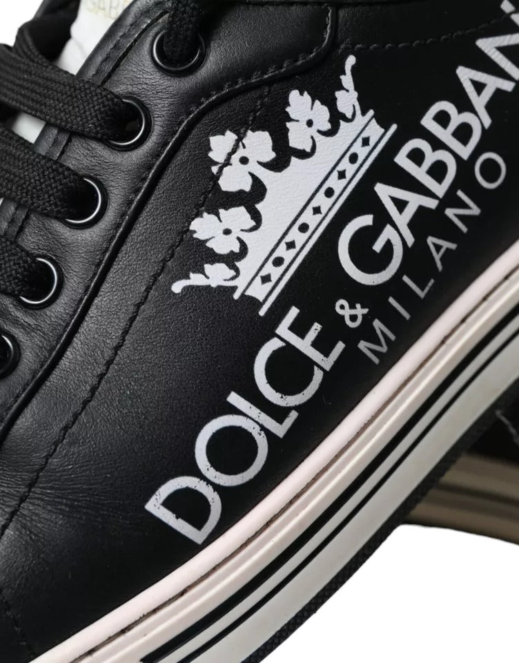 Black leather sneakers with crown logo, featuring pink accents and laces