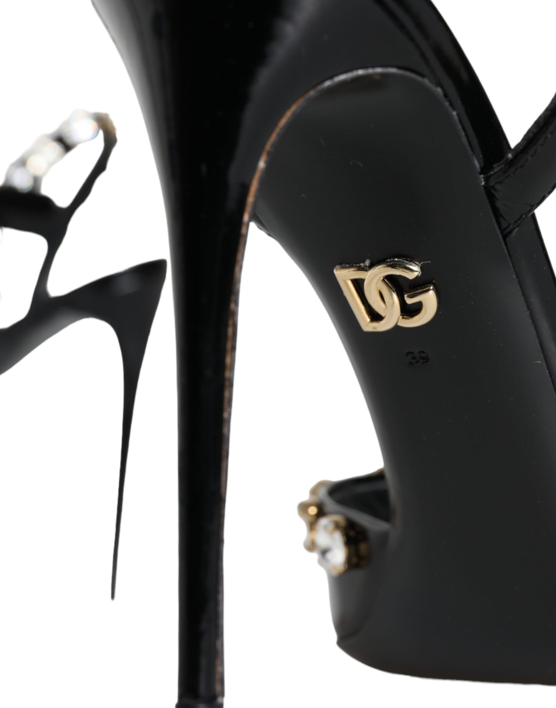 High heel shoe with gold logo on side