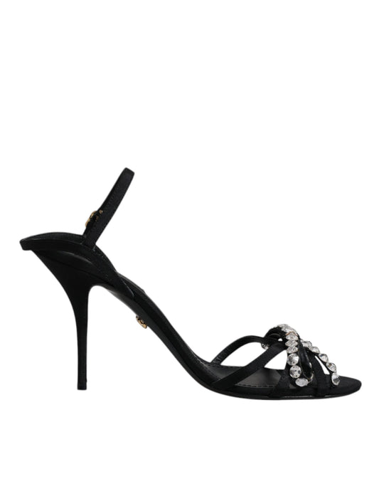 Black high heel shoe with embellishments on toe