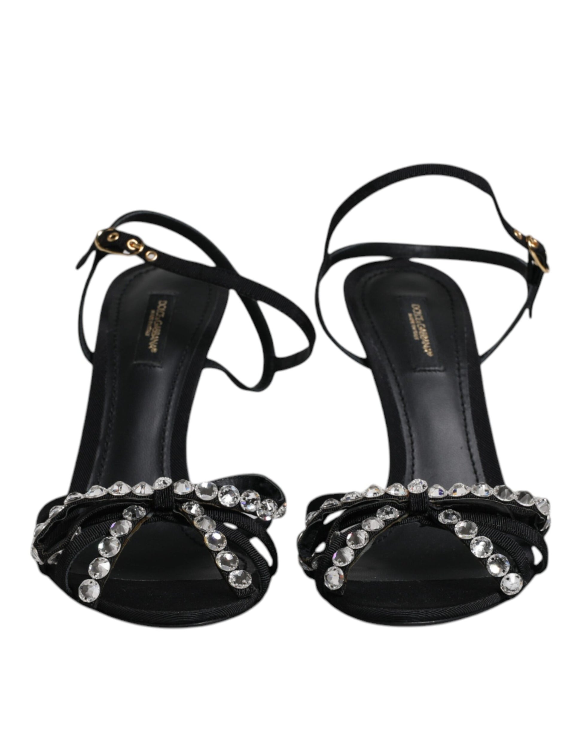 Pair of black high heel shoes with rhinestones on straps
