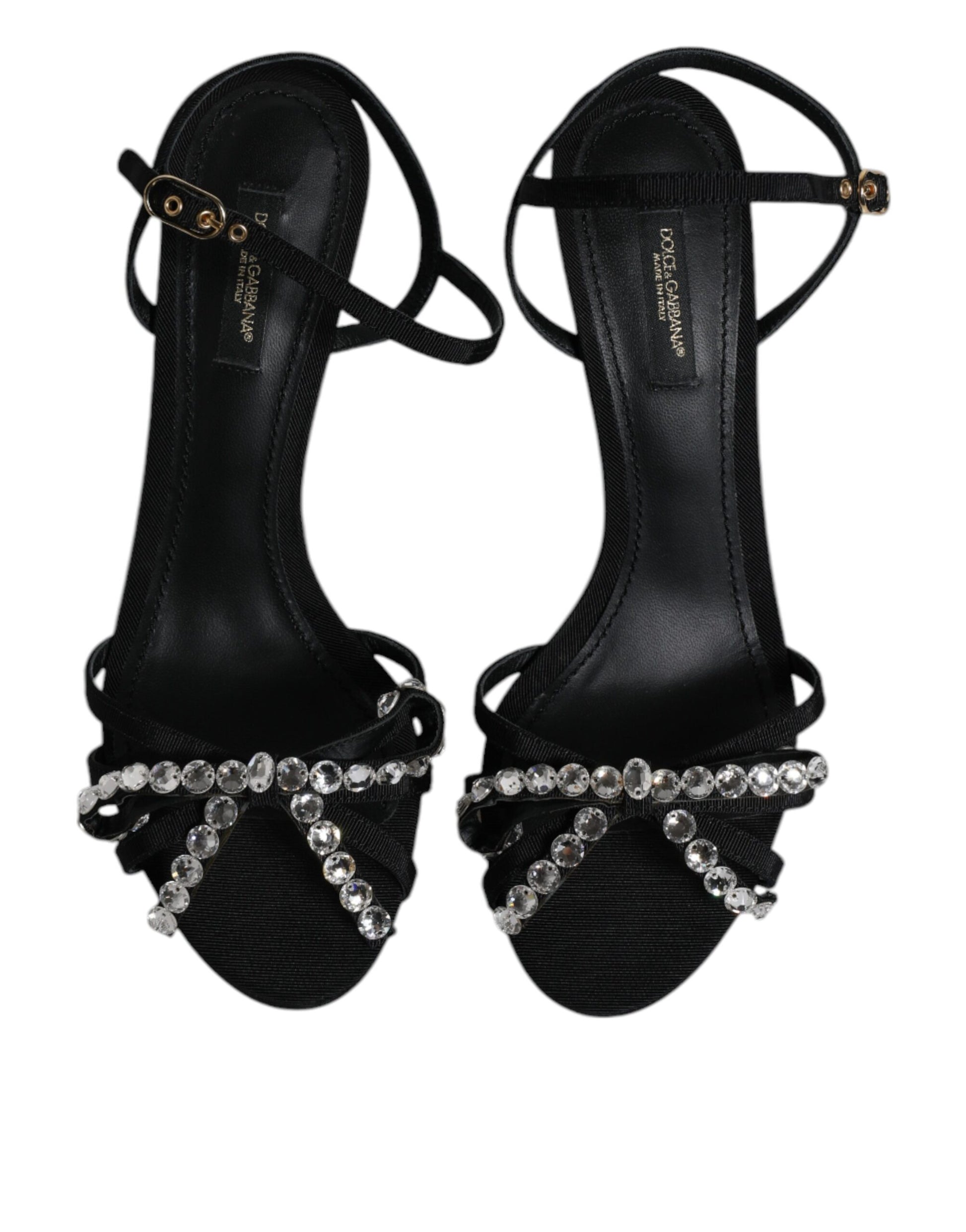Pair of black high heel shoes with rhinestones on straps
