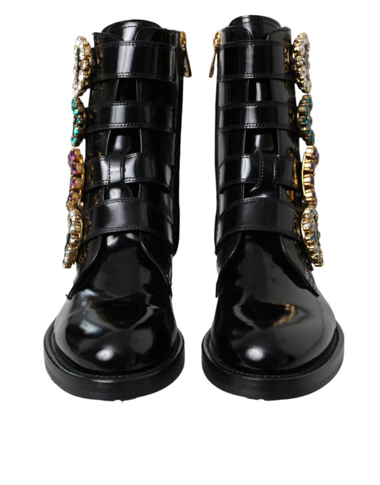 Black leather boots with gold accents and multiple straps