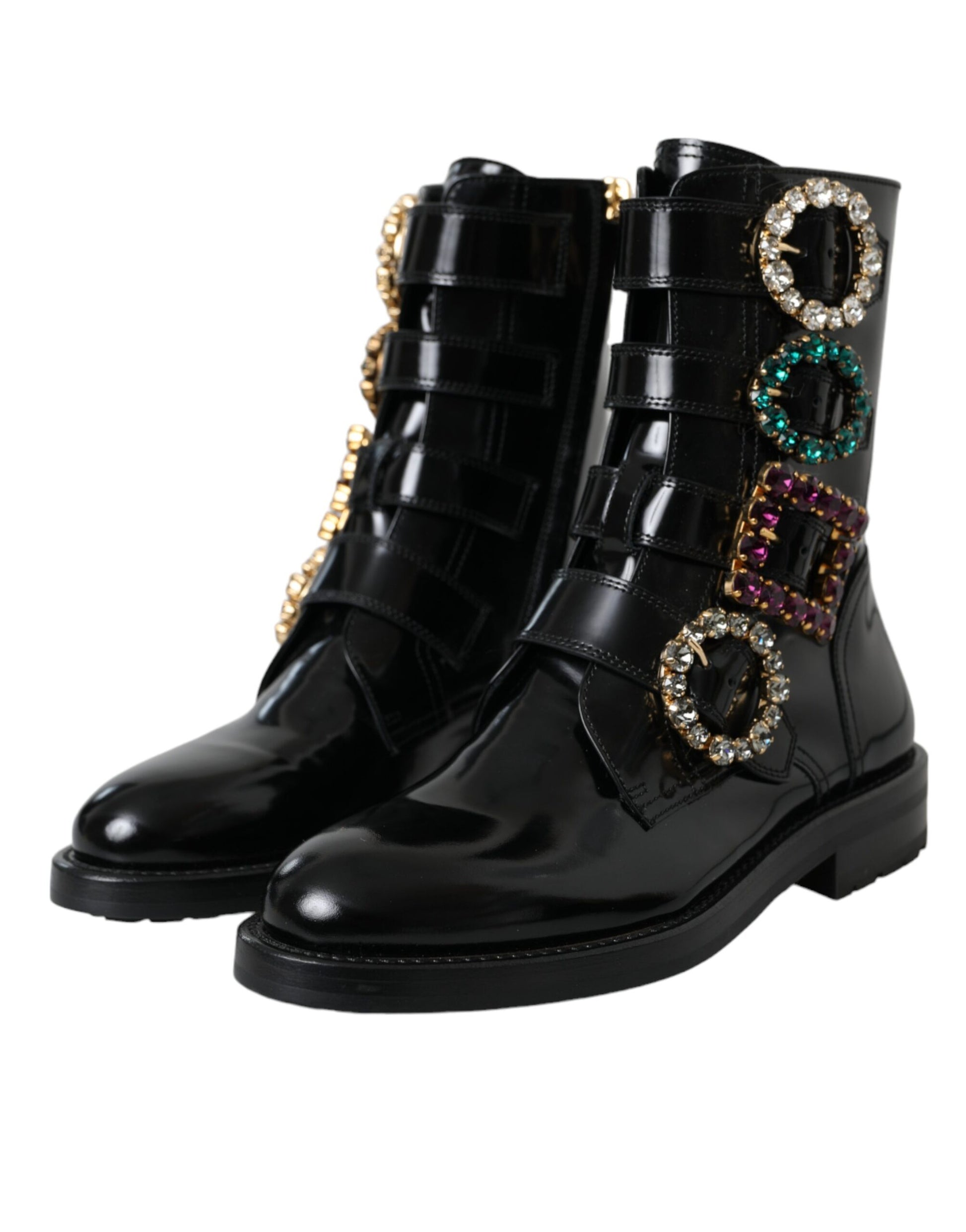 Black leather boots with gold buckles and colorful embellishments