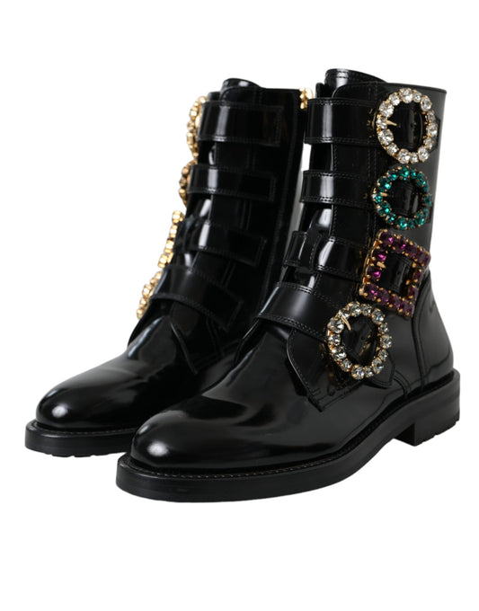 Black leather boots with gold buckles and colorful embellishments