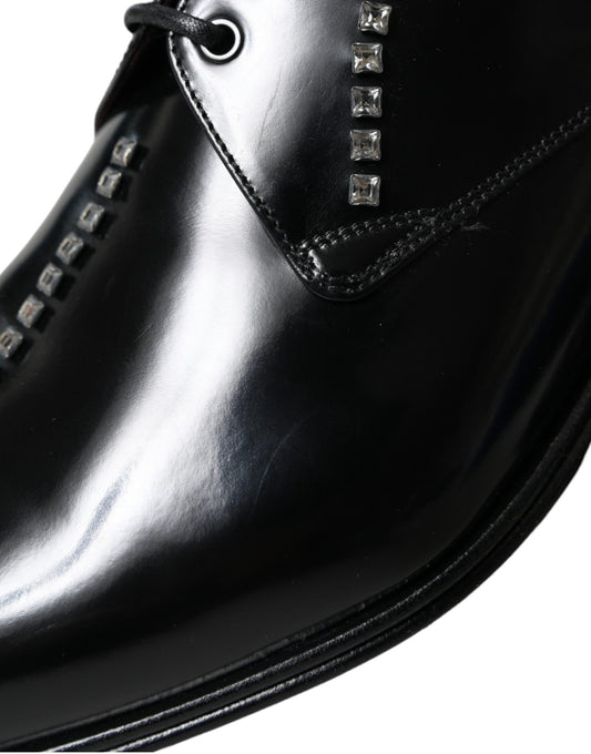 Black leather dress shoe with silver studs on side