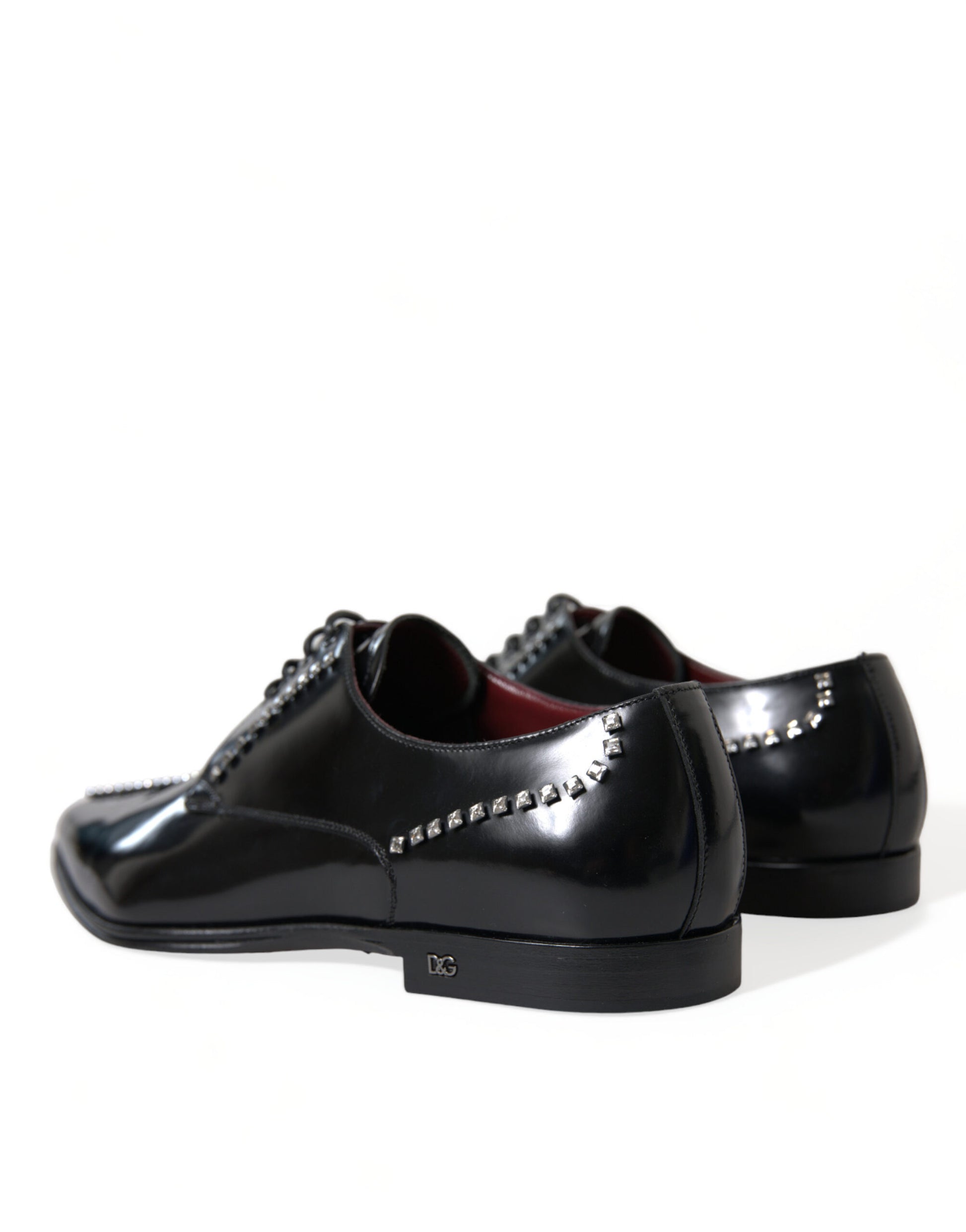 Black leather shoes with studded detailing