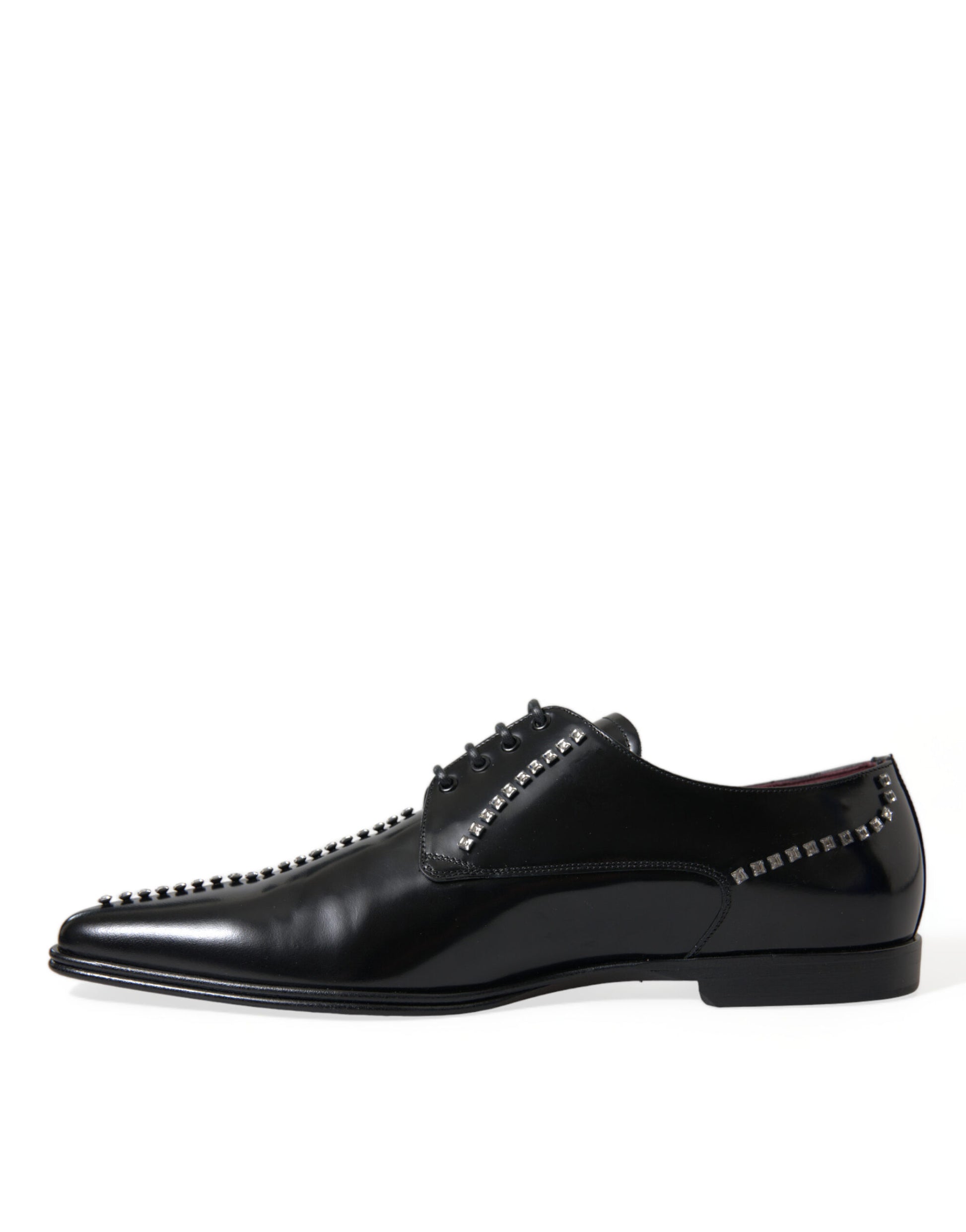 Black dress shoe with laces and embellishments on sides