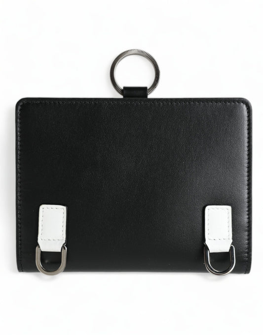 Black leather case with silver zipper and white straps