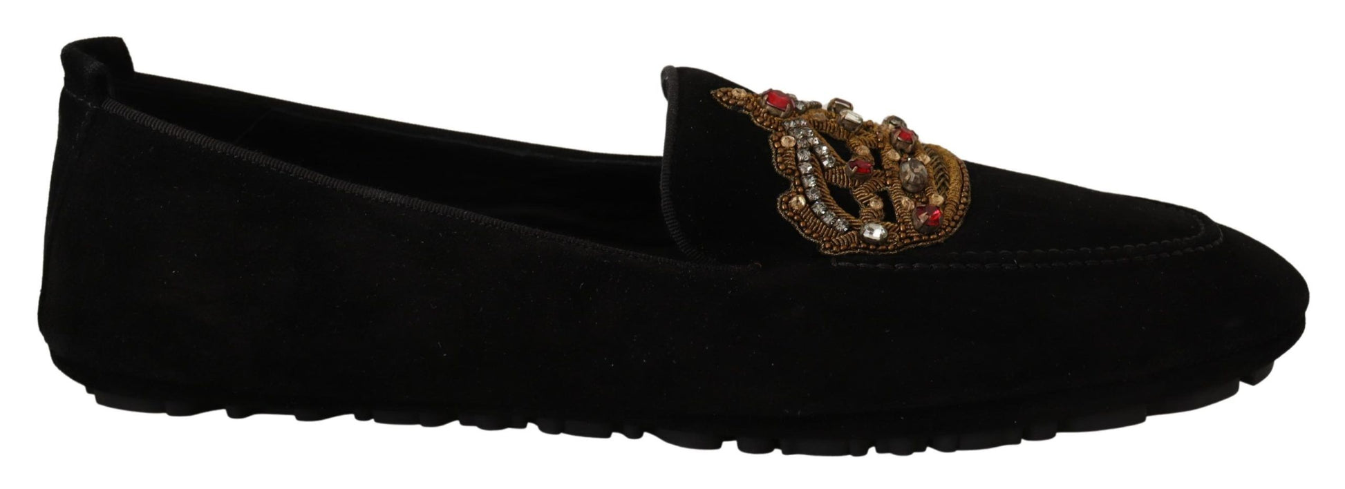 Pair of black shoes with gold embellishments and red stones