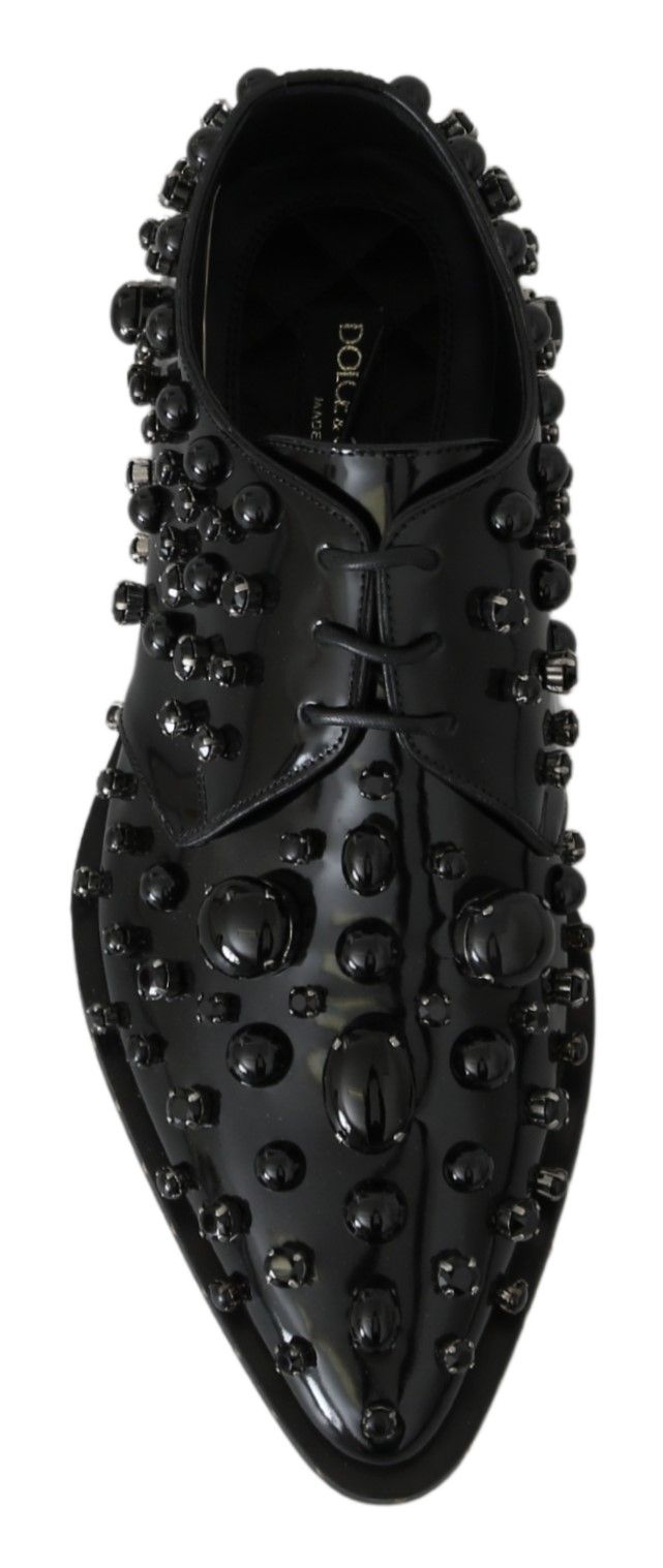 Black shoe with studs on the side