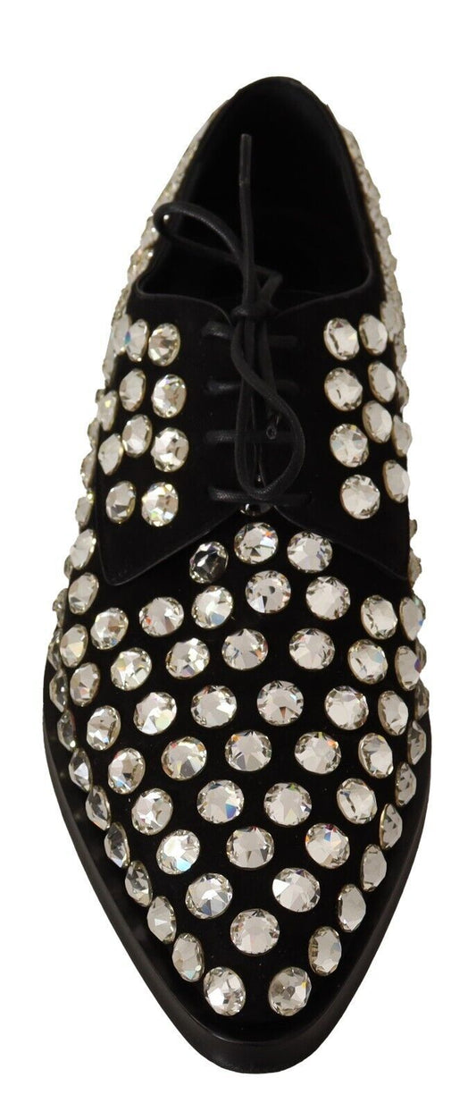 Black shoe with sparkling embellishments on toe and heel