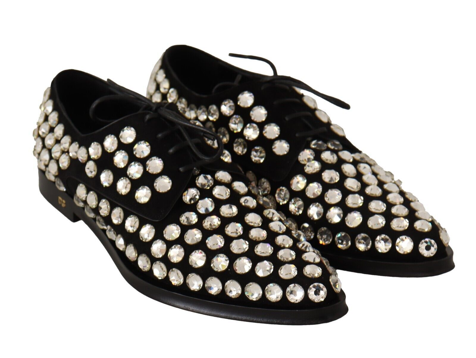 Pair of black shoes with numerous small crystals on top