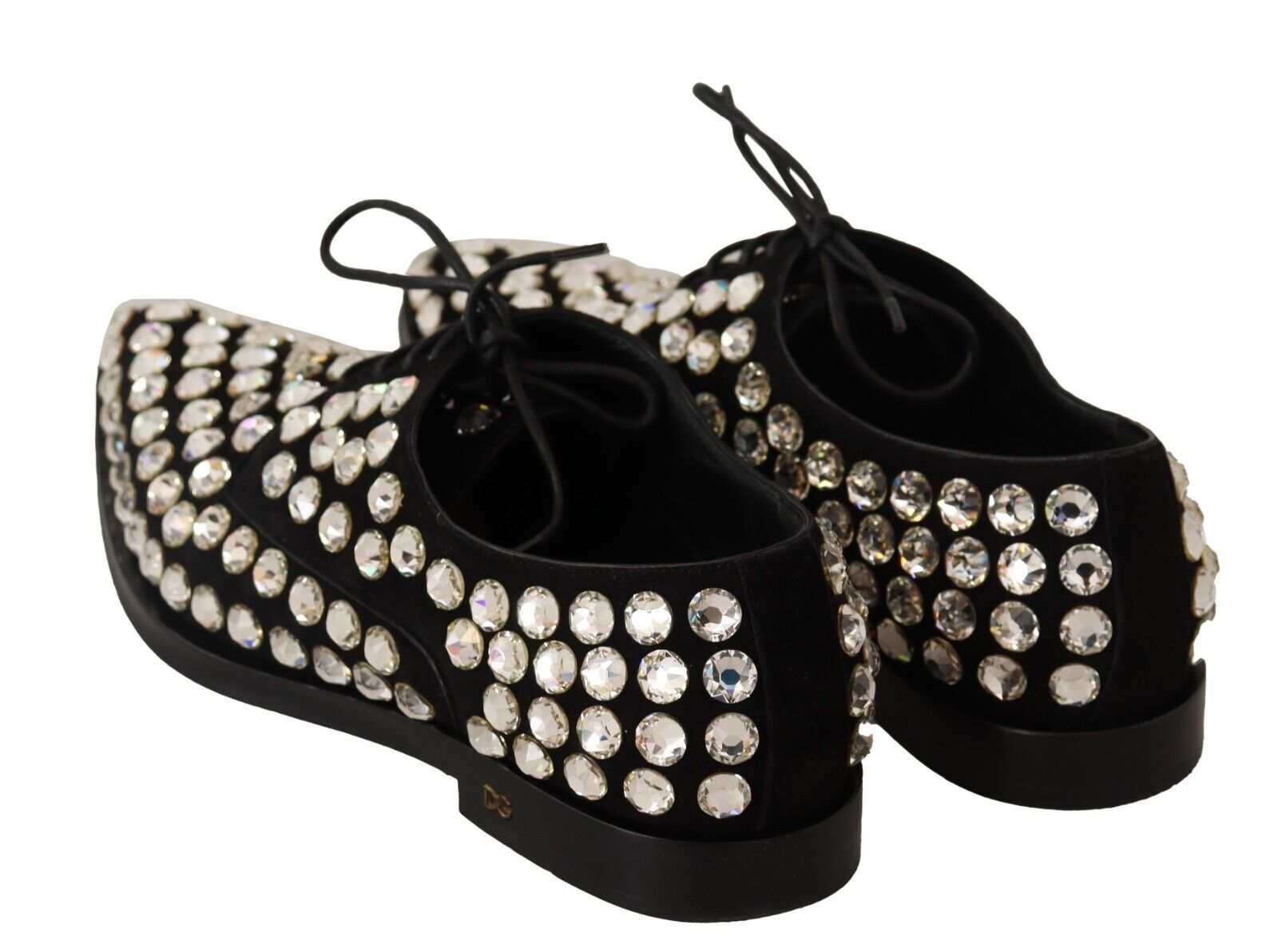 Pair of black shoes with sparkling crystals on top and sides
