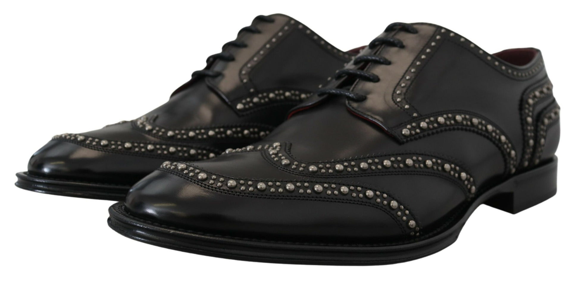 Pair of black leather dress shoes with studded detailing and laces, by Dolce & Gabbana