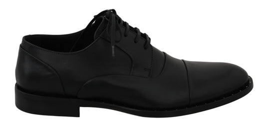 Black dress shoe with laces and a small heel
