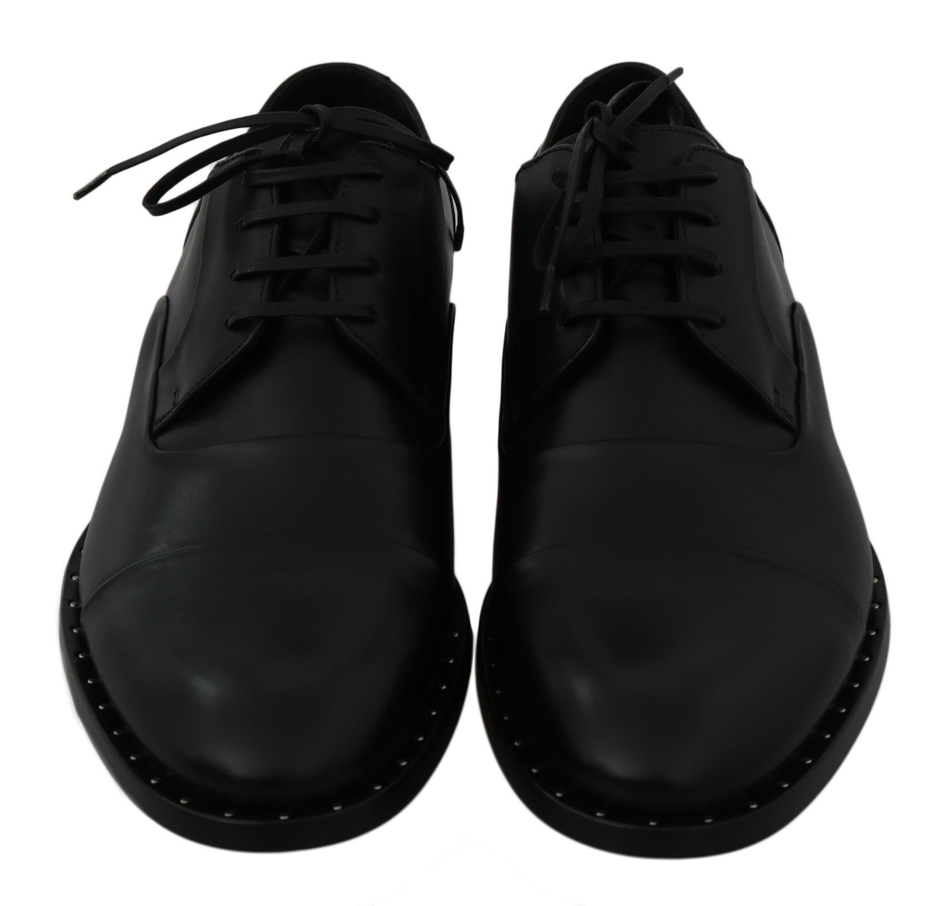Pair of black leather shoes with laces and stitching details