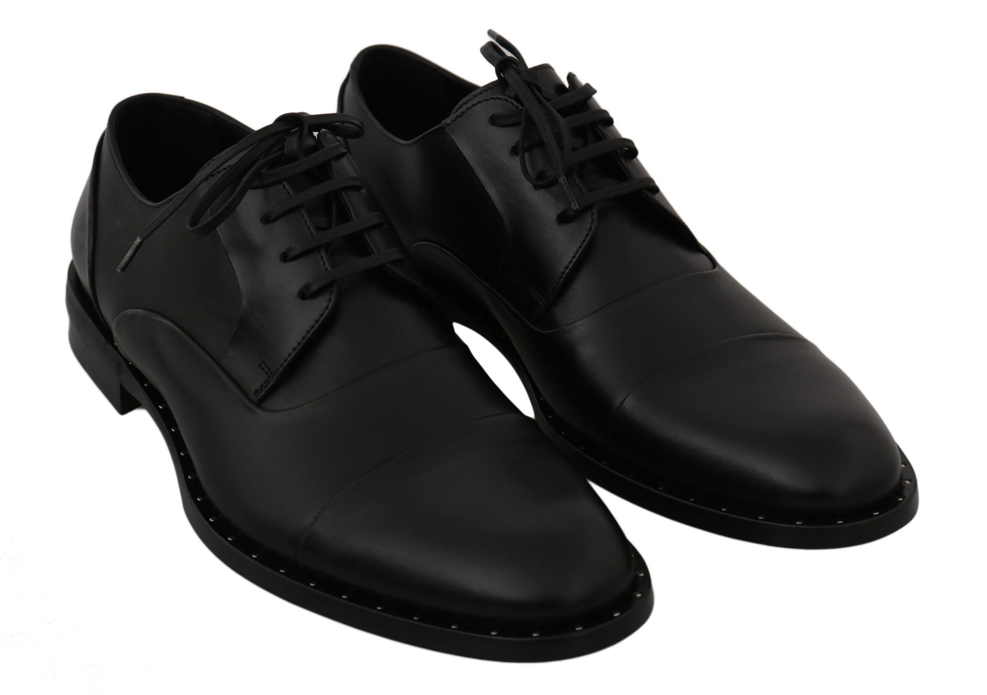 Pair of black dress shoes with laces and a small heel