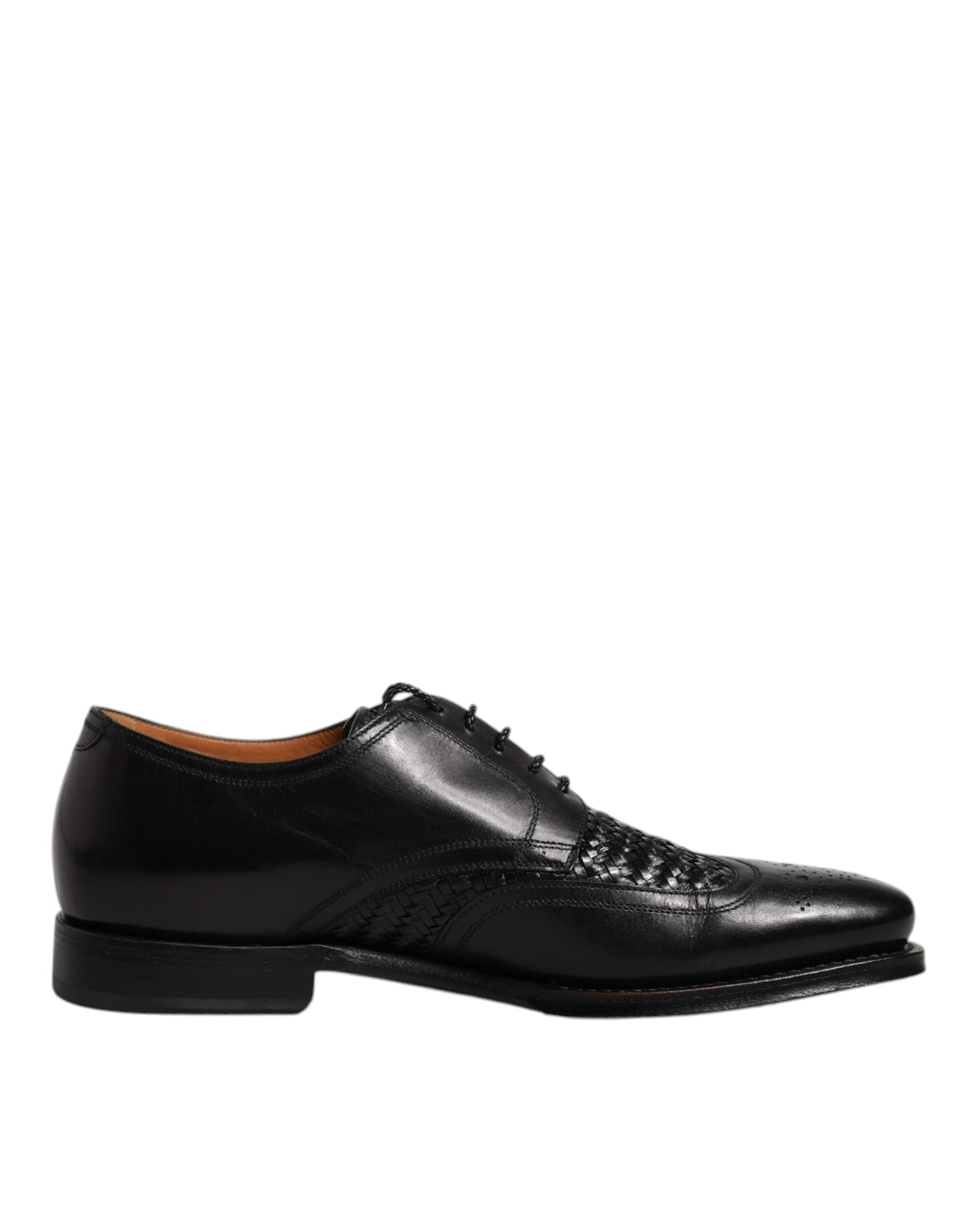 A pair of black leather dress shoes with laces, featuring a wingtip design