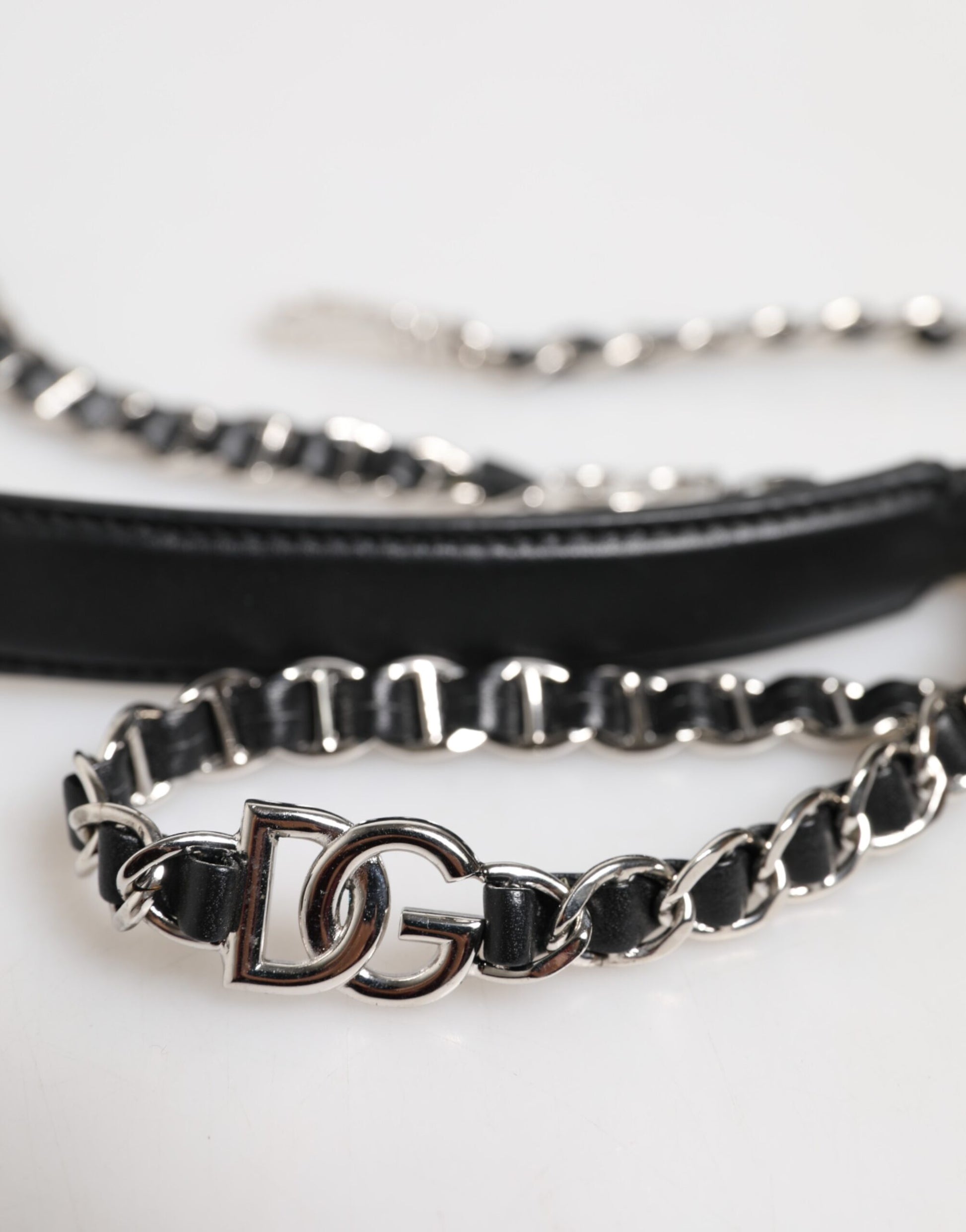 Silver chain bracelet with black beads and a silver DG charm