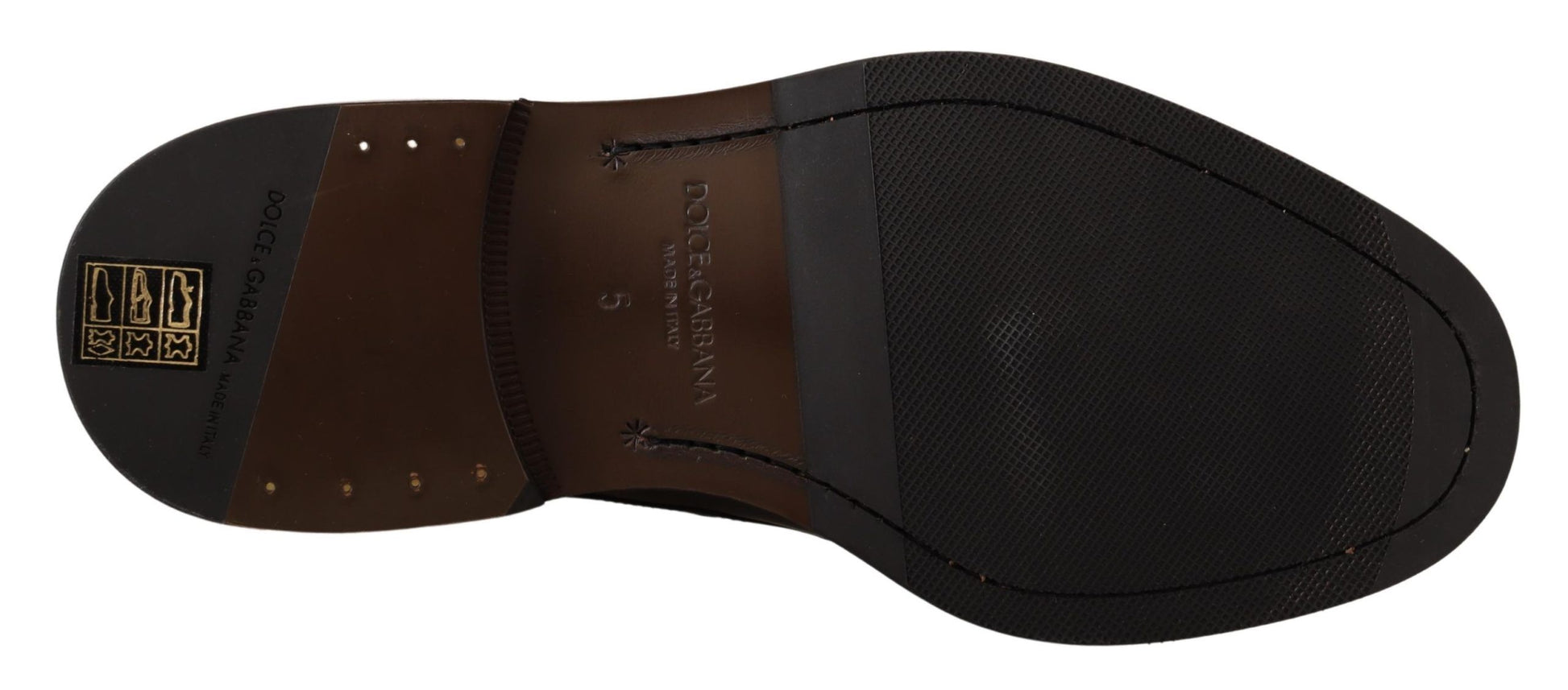 Pair of black shoes with brown straps and a logo on the side