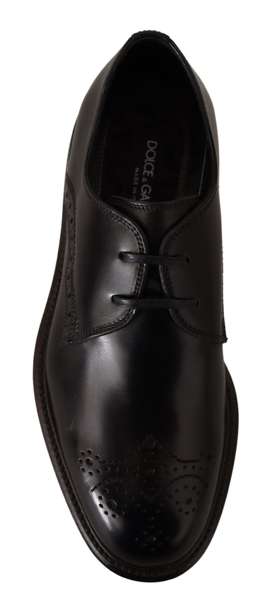 Black dress shoe with laces and patterned sole
