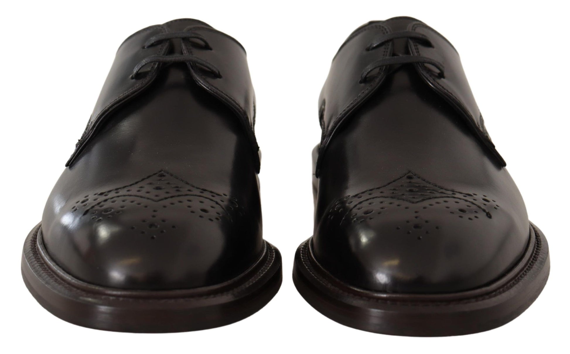 Pair of black leather dress shoes with laces and a bow tie design on top