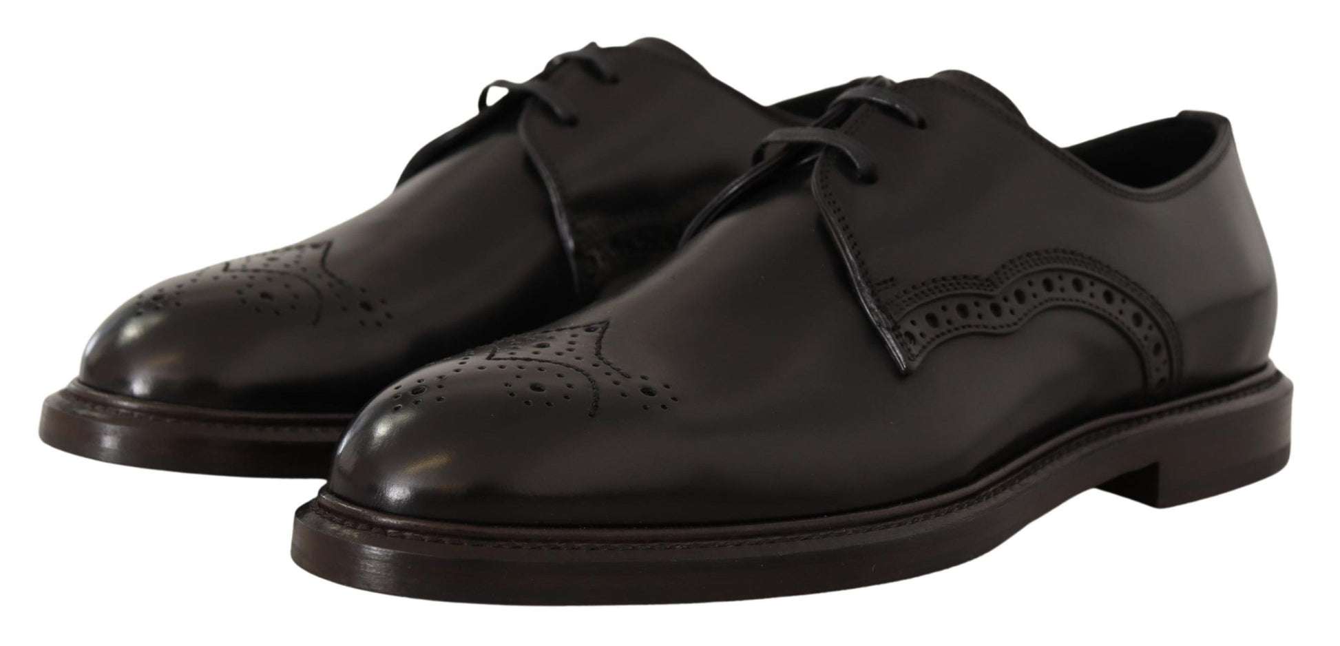 Pair of black dress shoes with laces and a small heel